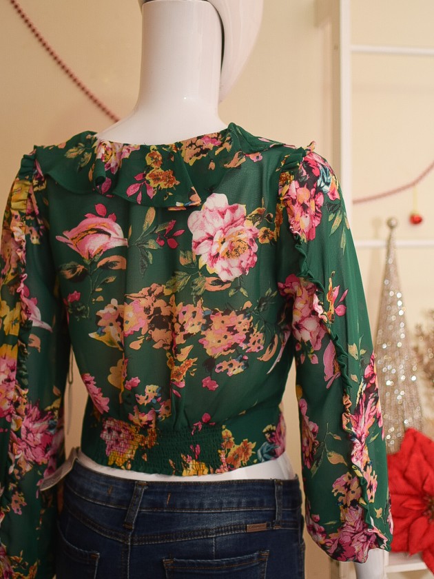 Top floral con revuelo